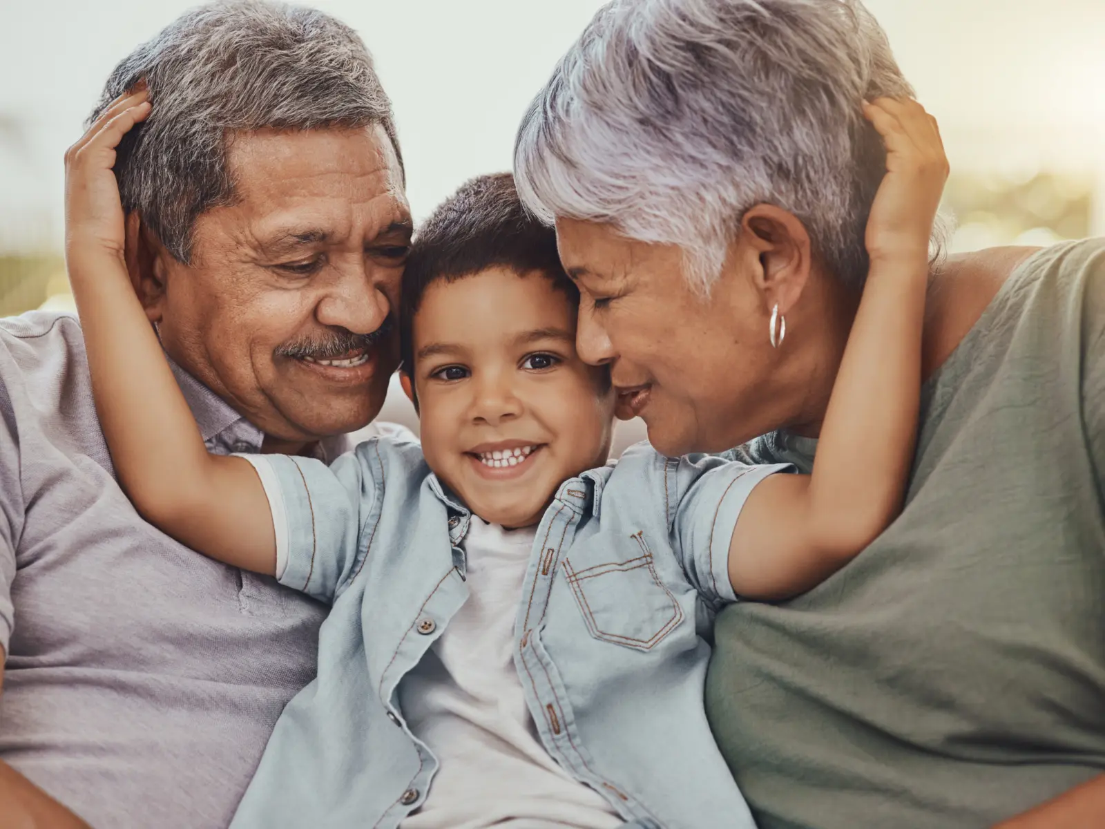 Image of grandparents with grandchild.