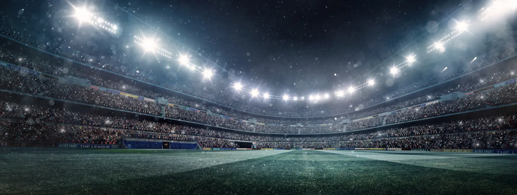A packed stadium illuminated by bright lights, with a vibrant crowd cheering and a snowy atmosphere enhancing the thrilling scene.